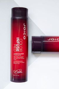 Color infuse red conditioner bottle
