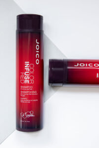 Color infuse red shampoo bottle