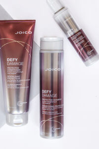 defy damage shampoo conditioner and shield bottles