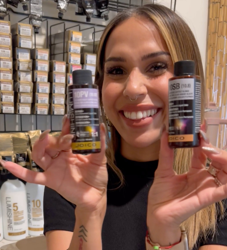 mai holding lumishine 10pv and 10sb bottles