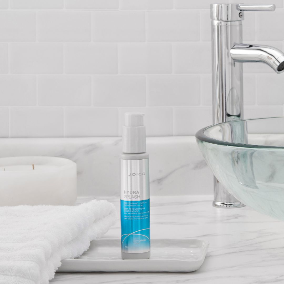hydrasplash bottle in try next to sink