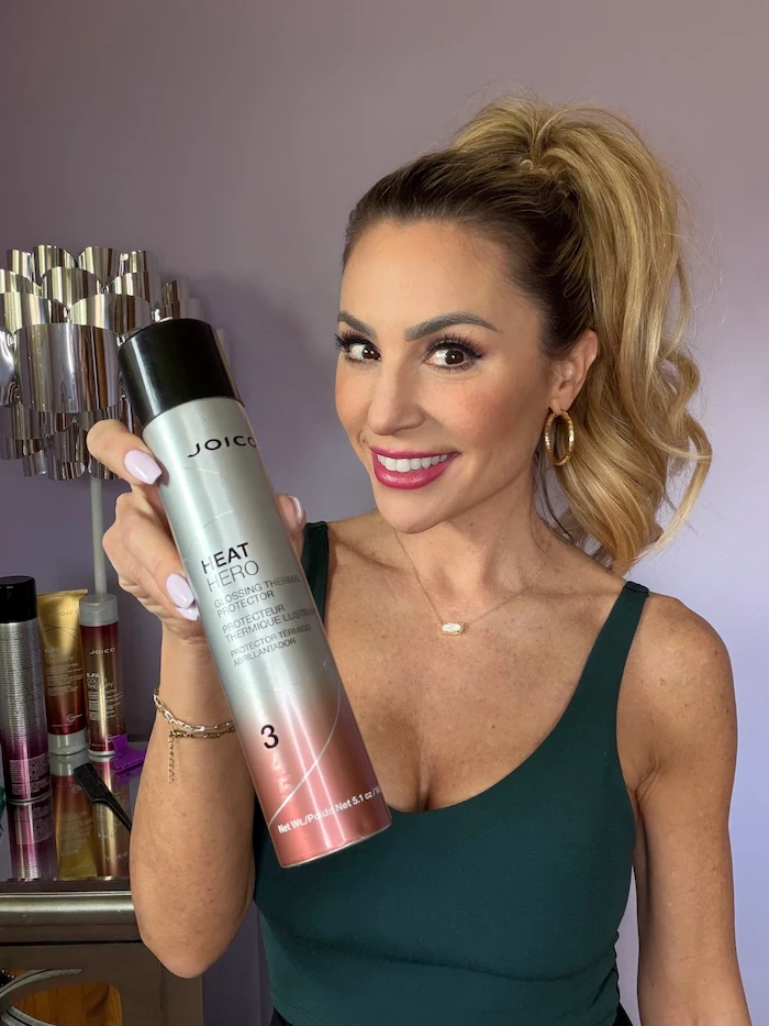 Vanessa Drozda with ponytail holding Heat Hero bottle